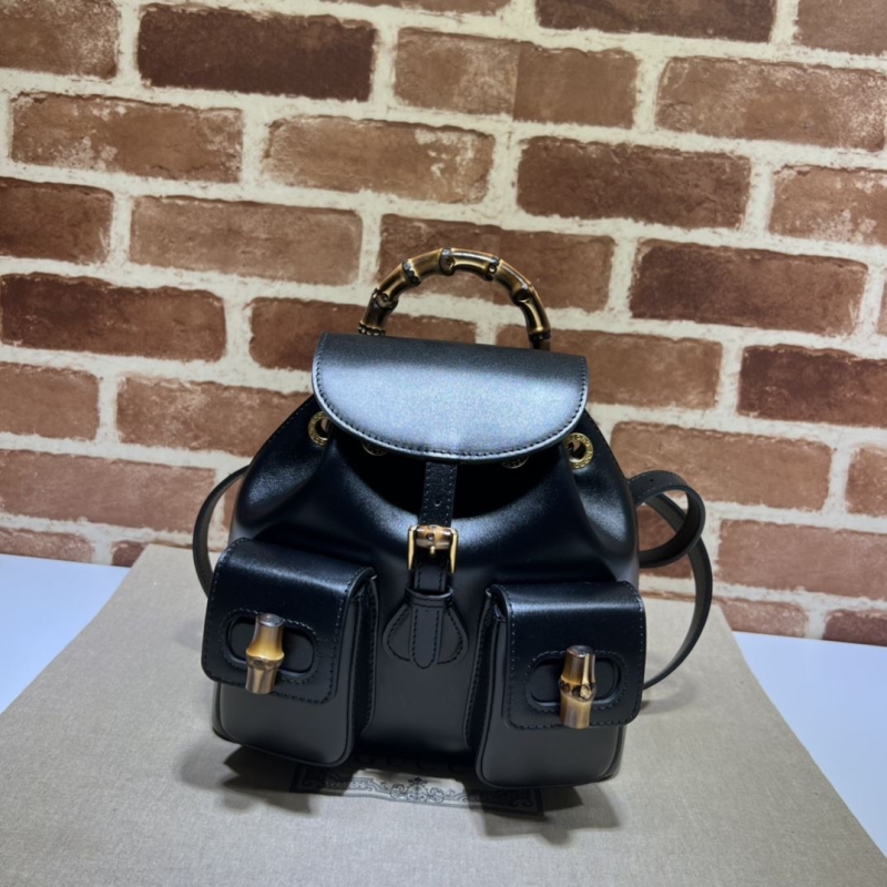 G*u*i backpacks